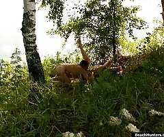 Fuckish guy licking pussy of a chick near the river